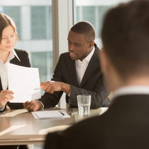 employers discussing performance appraisal with employee