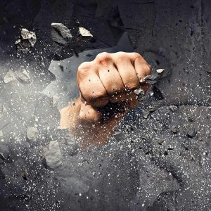 Fist Punching Through Wall - Why Some People Don't Want to Breakthrough - Breakthrough Leadership