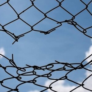 A Breakthrough Through A Wire Fence